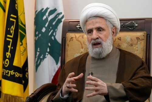 Hezbollah chief says won't surrender under Israeli threats