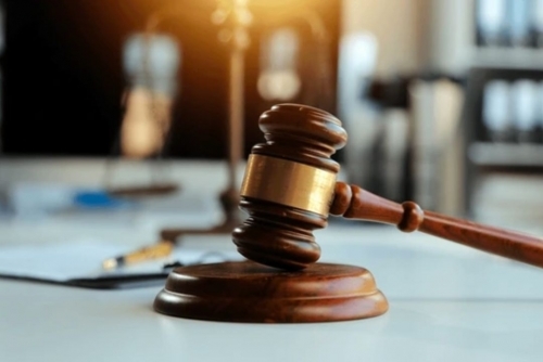Company worker denies role in drug parcel from US