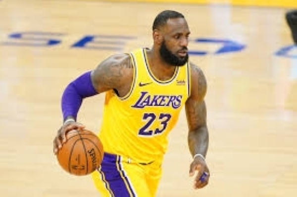 James opts in with Lakers for next NBA season
