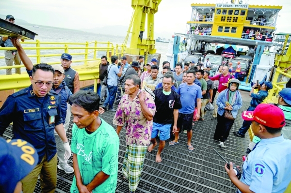 Indonesian rescuers widen search for missing after ferry sinks