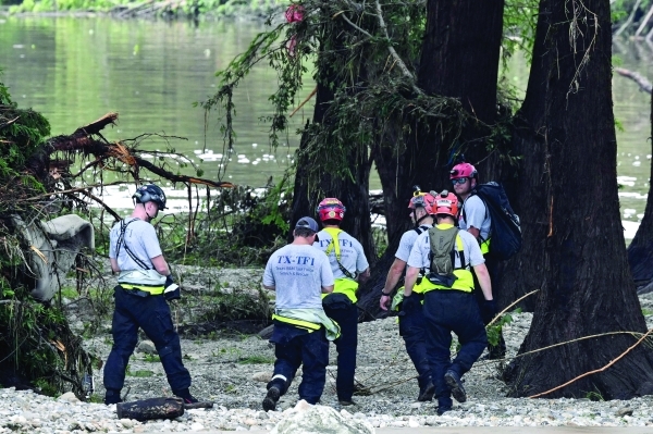 Rescuers search for missing girls as Texas flood death toll hits 50