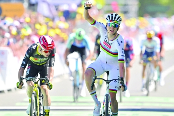 Pogacar back in yellow after winning stage seven of Tour de France