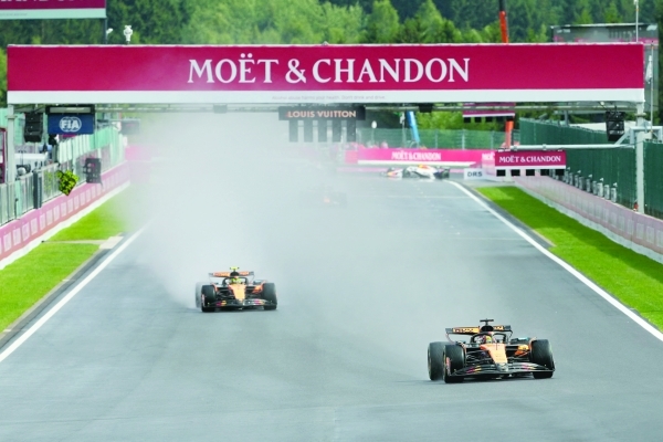 Piastri beats Norris in rain-hit Belgian Grand Prix