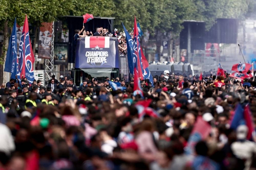 Carnival atmosphere in Paris after Champions League success