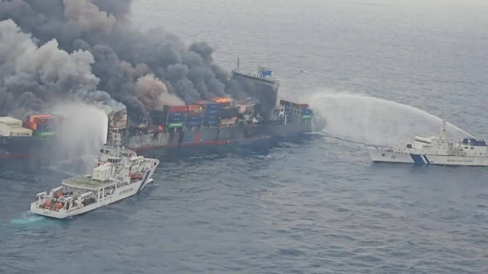 Four crew members missing as Singapore-flagged cargo ship burns off India coast