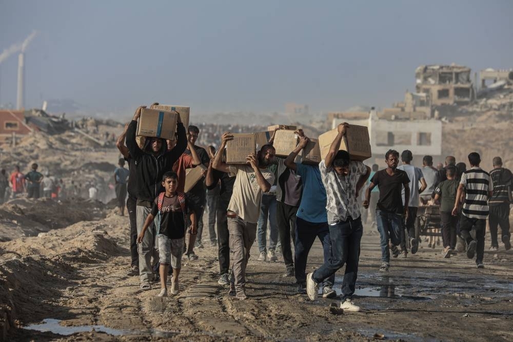 Dozens of Palestinians reported killed near aid distribution centre in Gaza