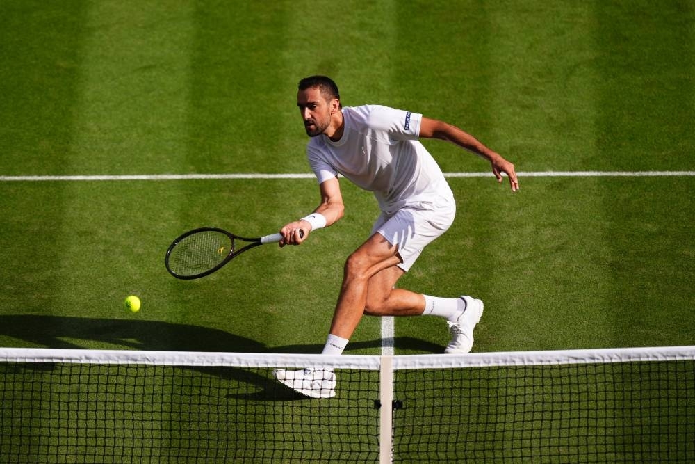 Draper knocked out by inspired Cilic