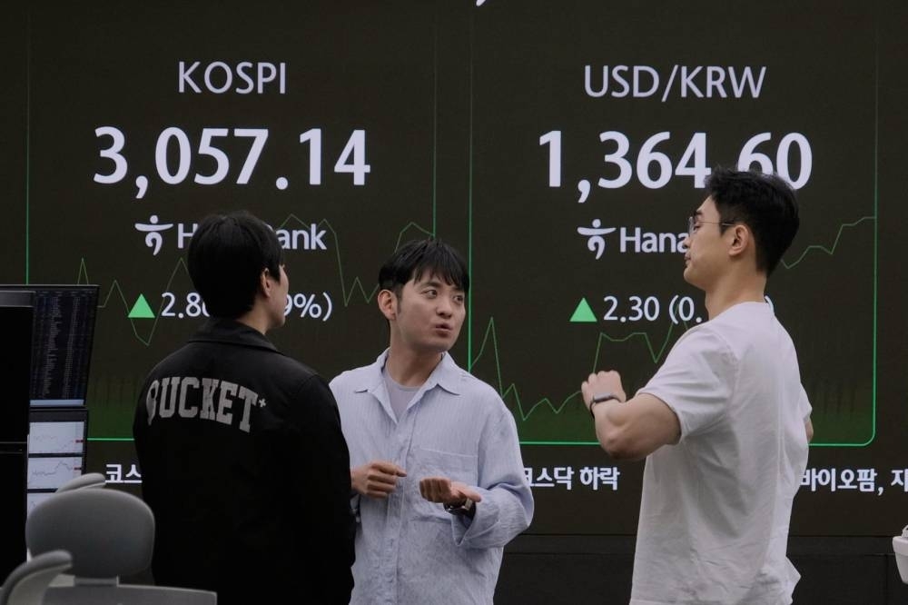 Global shares mostly down as Trump's tariff deadline looms