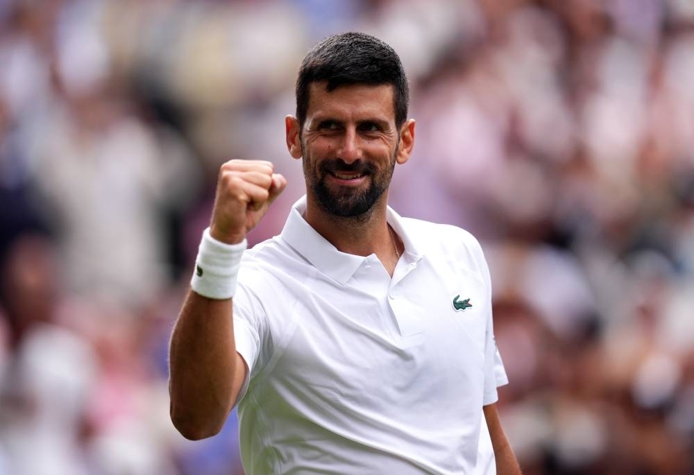 Djokovic overcomes historic bad start to reach Wimbledon quarter-finals