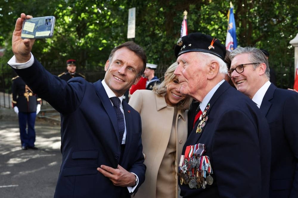 Macron promises ‘tangible results' on migration