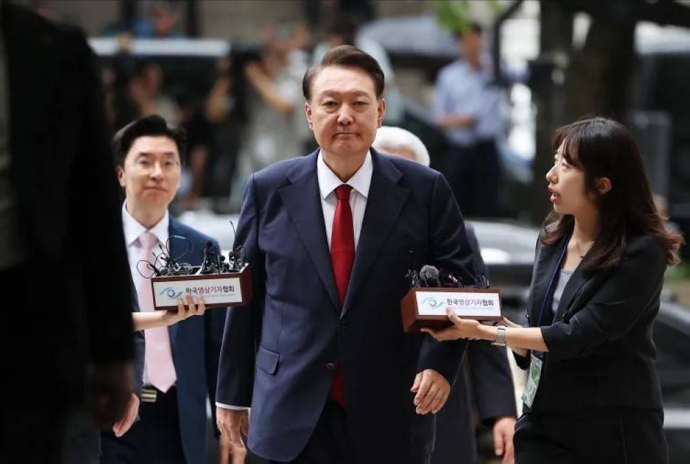 South Korea issues arrest warrant for ex-President Yoon