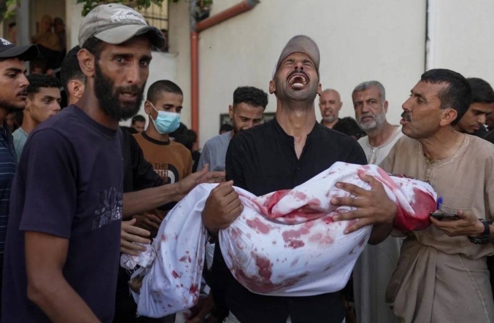 Children collecting water among 59 Gazans killed by Israel