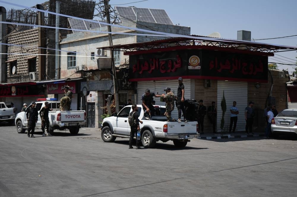 Clashes kill at least 89 in southern Syria as Israel strikes tanks