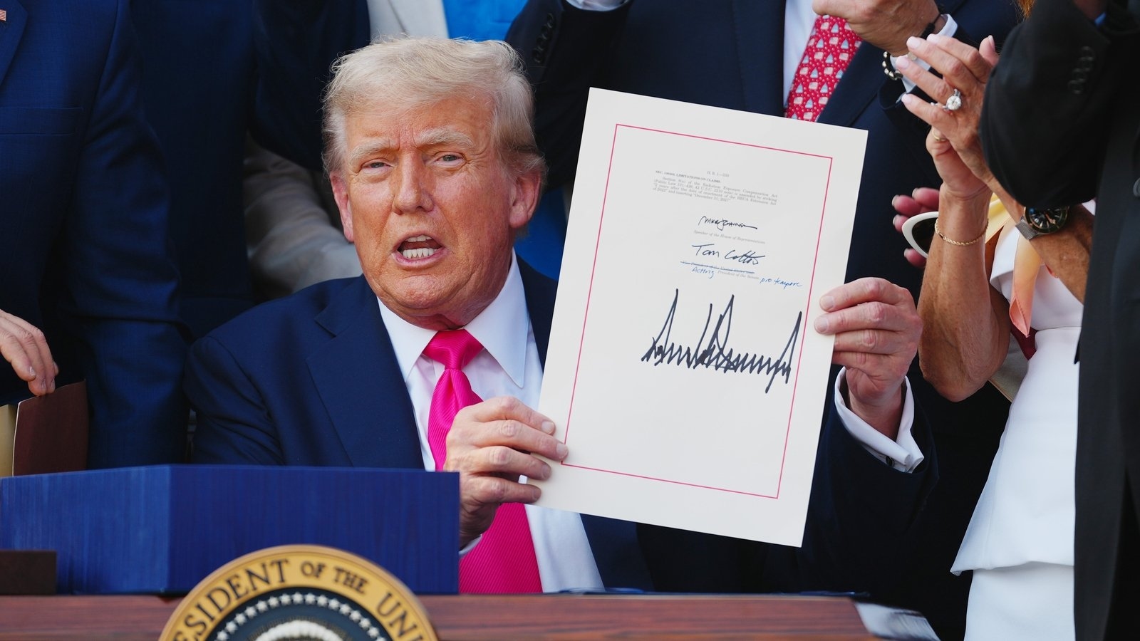 Hope that gain masks pain as Trump signs 'beautiful' bill