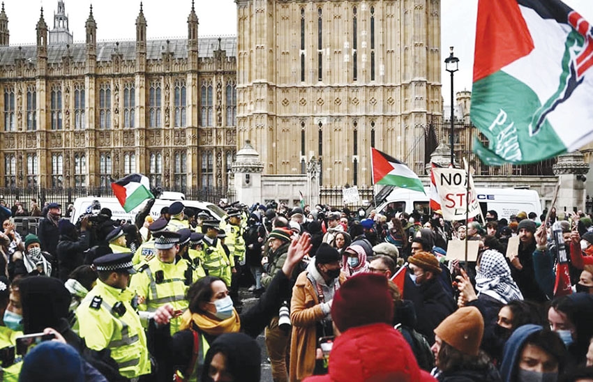 Thousands form human cordon around British Parliament to halt arms exports to Israel