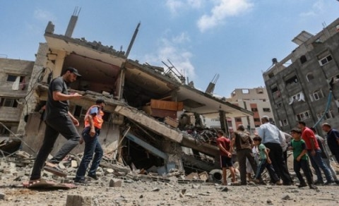 Gaza Civil Defense Rescues Palestinian Woman