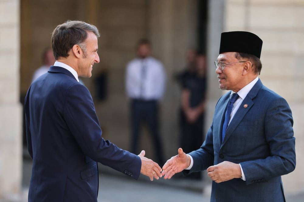 PM's political secretary slams 'narrow-minded' criticism of overseas visits