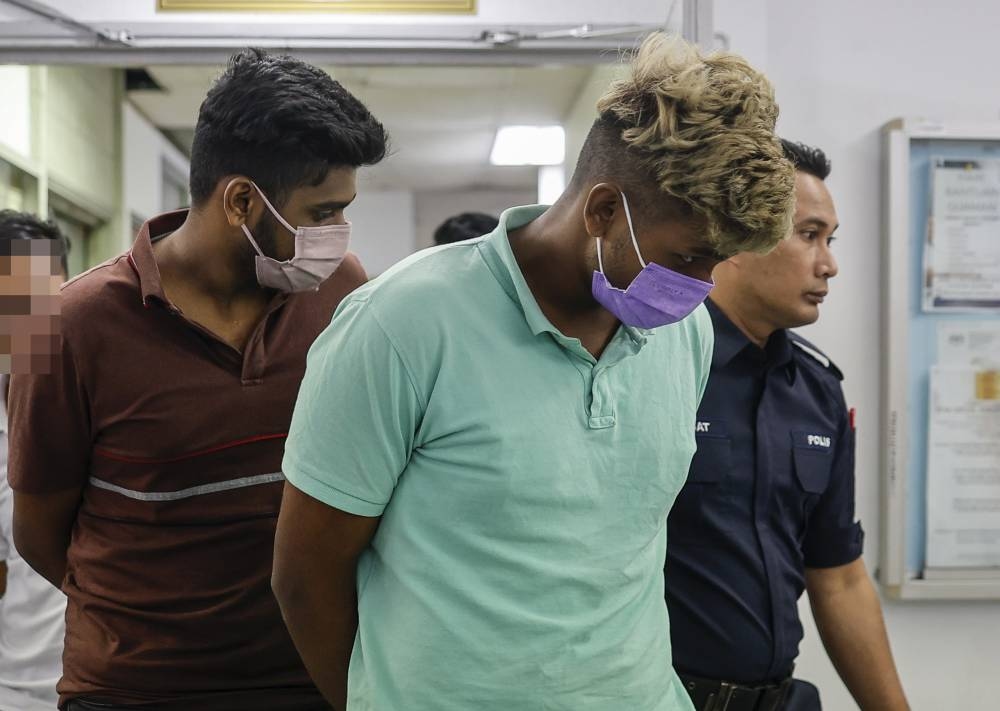 Two brothers charged with kidnapping, causing hurt to man in Puchong