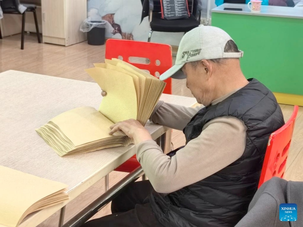Visually impaired Chinese readers find light in books