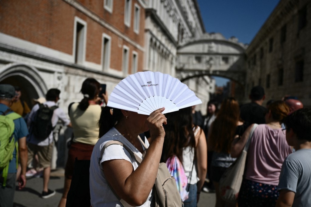 Europe bakes in summer's first heatwave as continent warms