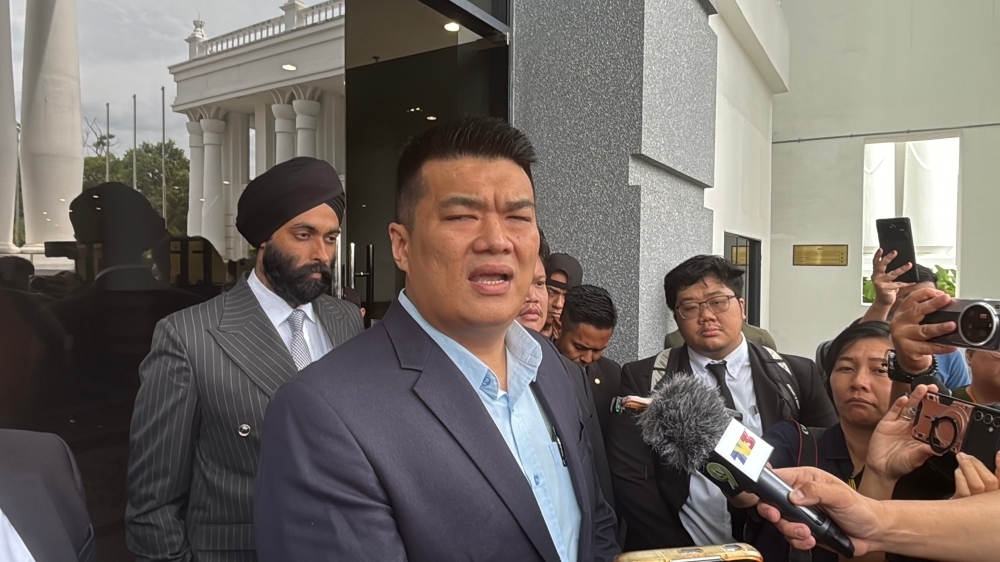 ‘Ikan bilis' charged, ‘sharks' walk free: Businessman cries foul in Sabah graft case