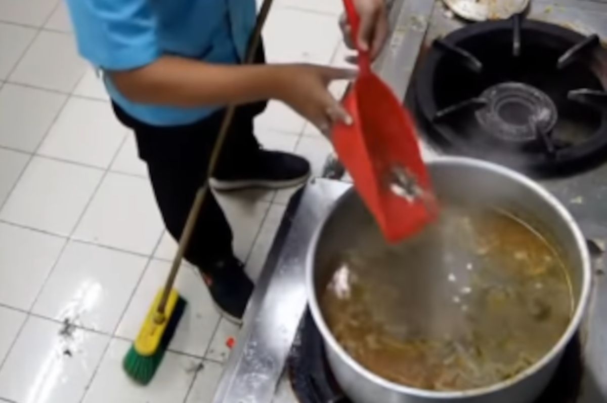 Shocking viral video shows cleaner emptying DIRT into food