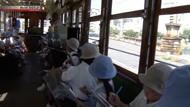Children in Hiroshima learn about atomic bombing aboard restored streetcar